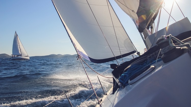 sailing in the wind through the waves, yachts at sailing regatta