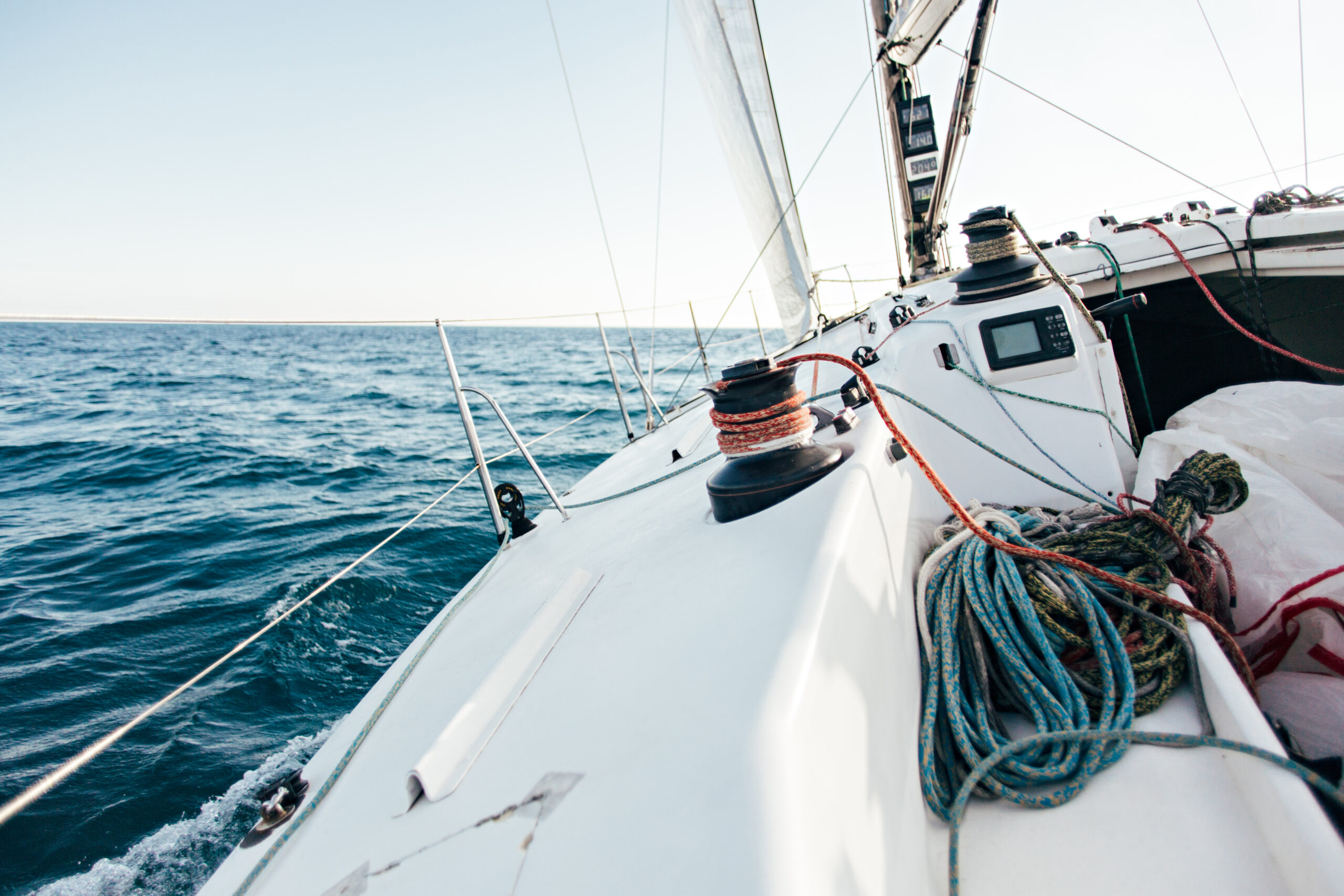 deck of professional racing yacht leaning in wind