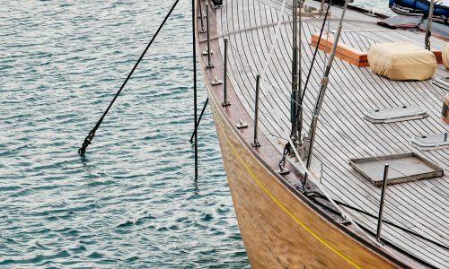 vertical picture sailing boat sea sunlight